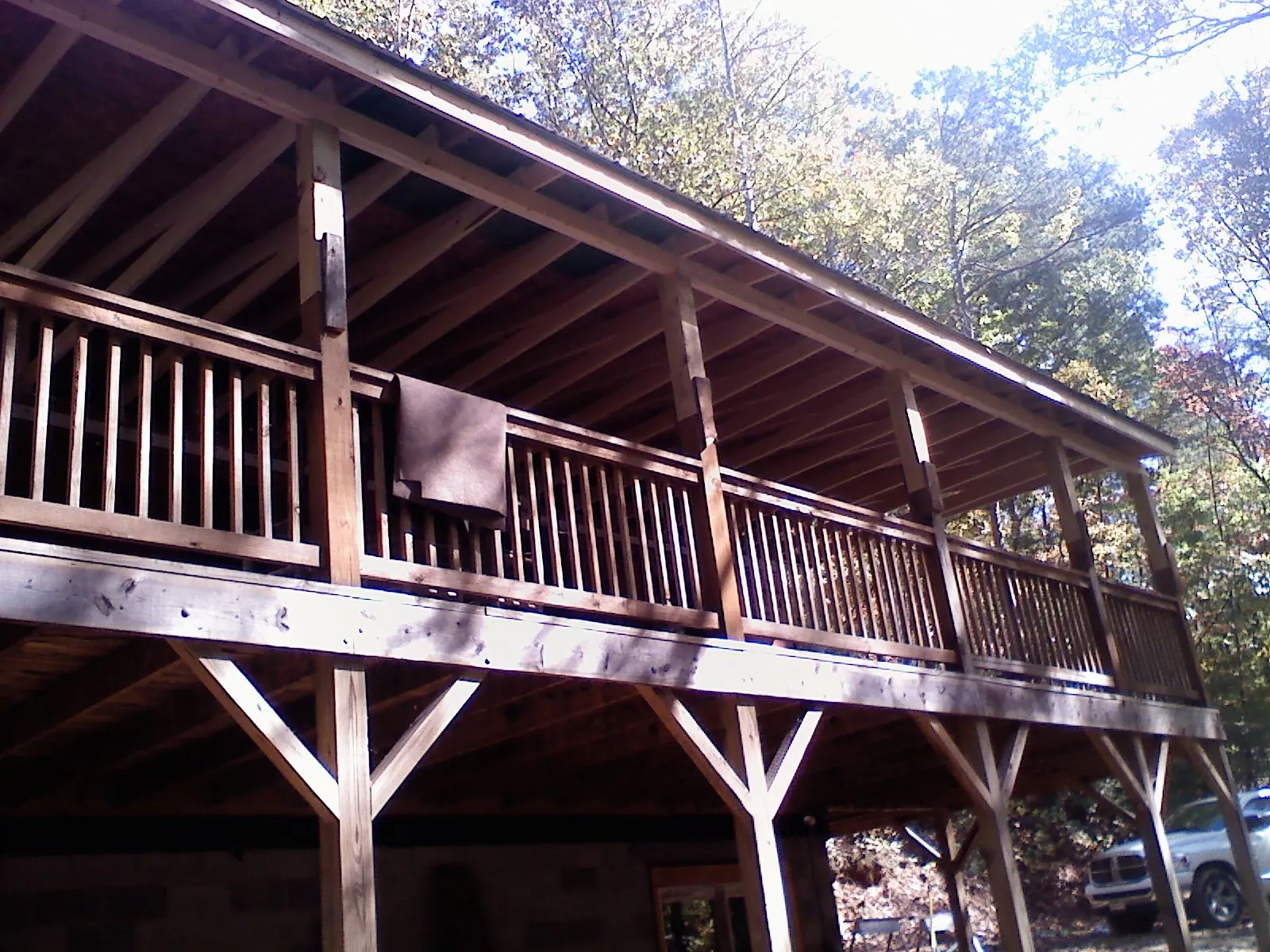Timber framing under a new elevated porch and deck — Roof Leak Repair in Santa Rosa Beach by Roofing Brothers